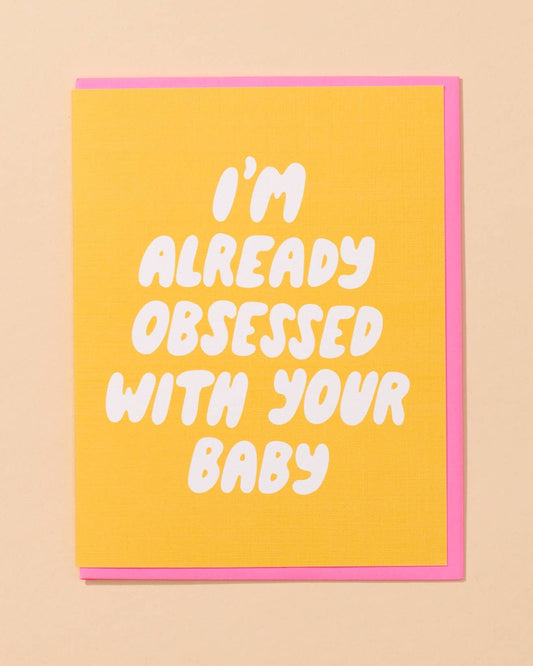 yellow baby card that says I'm already obsessed with your baby
