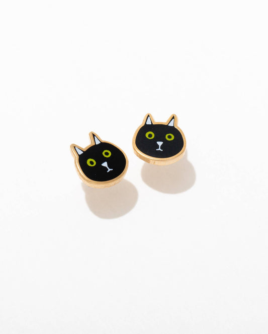 A pair of black cat-themed enamel stud earrings with gold-colored accents, displayed against a white background.