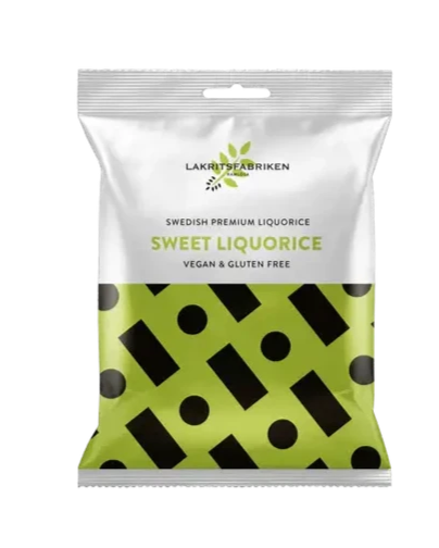 A packaged product labeled 'Lakritsfabriken Sweet Licorice', indicating that it is Swedish premium licorice, gluten-free, and vegan. The packaging is white with green and black dots pattern.