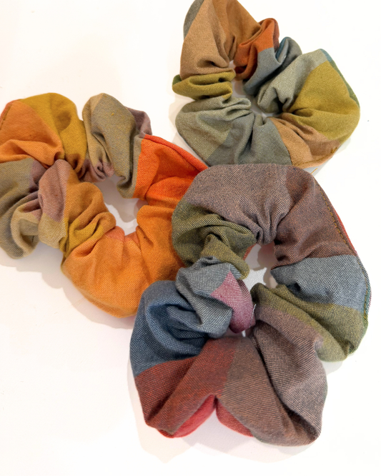 Set of colorful scrunchies on a white background