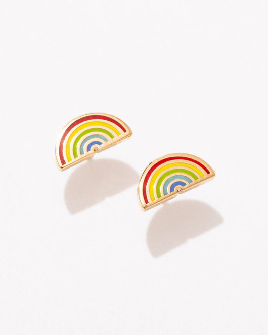 A pair of rainbow-colored enamel stud earrings with gold-plated brass details.