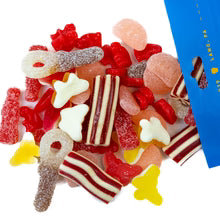 Assorted Swedish gummy candies (sweet and sour mix) on a white background