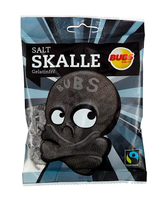 A package of BUBS salted licorice skulls with a playful design, predominantly black color with a smiling skull face, and a 'Vegan' and 'Gluten-Free' label on the packaging.