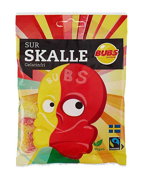 A package of BUBS Surskalle (Sour Skulls) candy featuring two cartoon skull characters in a colorful design.