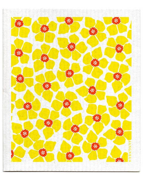 A white Swedish dishcloth with a yellow and red floral daffodil pattern.