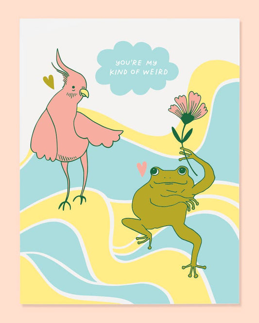 A colorful greeting card with an illustration of a pink bird and a green frog, with the text 'You're my kind of weird' and 'I love you'.