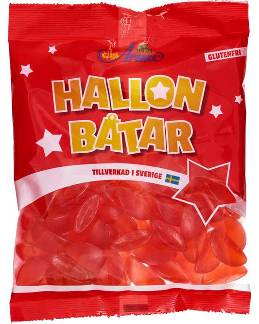 A package of Aroma Hallonbåtar, which are red raspberry gummy candies, with the brand's logo and ' Tillverkad i Sverige ' text indicating they are made in Sweden.