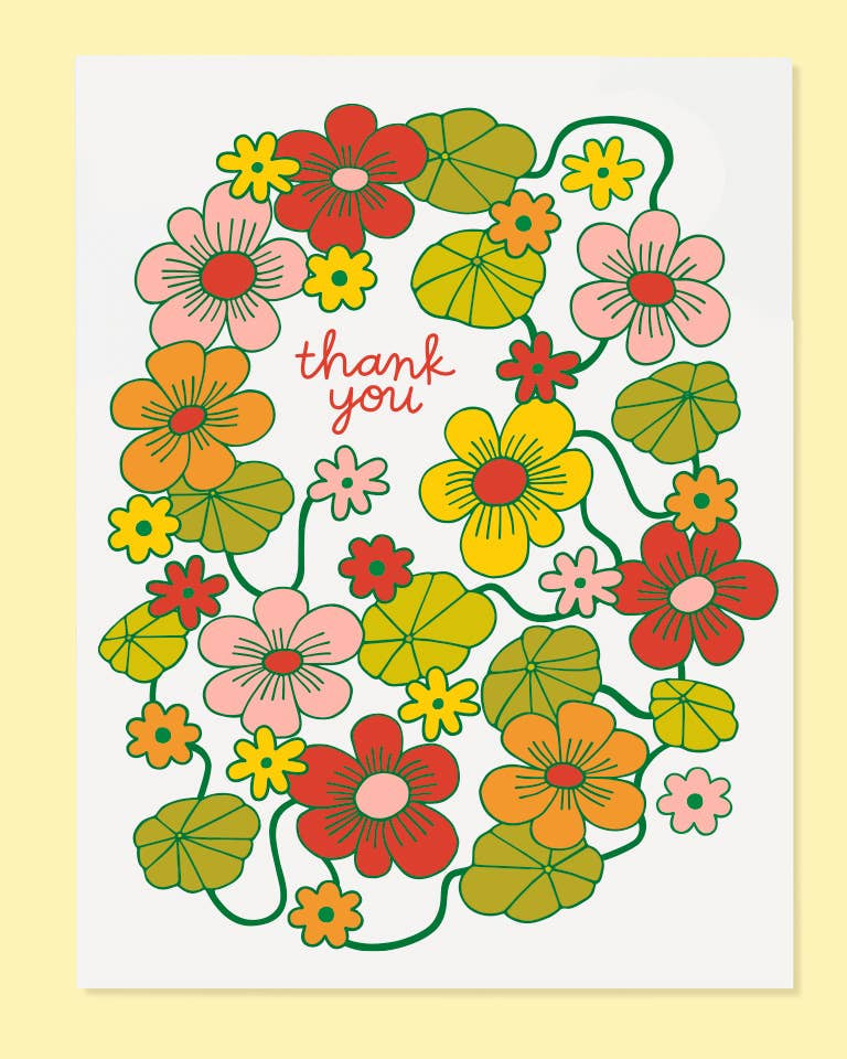 Floral wreath card with 'thank you' text on a yellow background