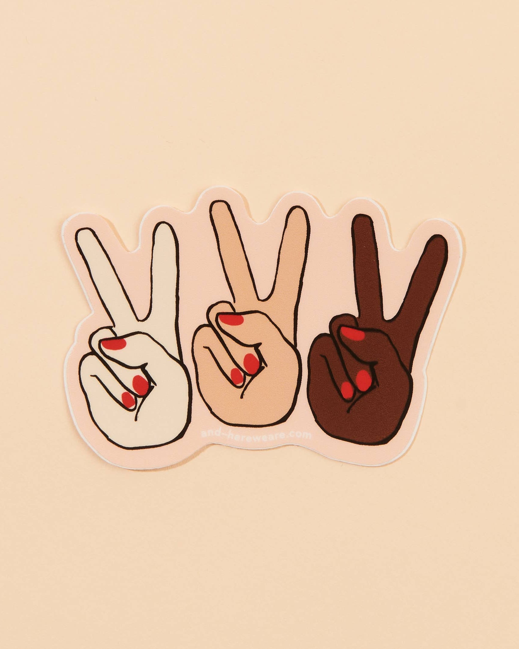 Three hands making peace signs in white, beige, and brown with red nail polish on a beige background.