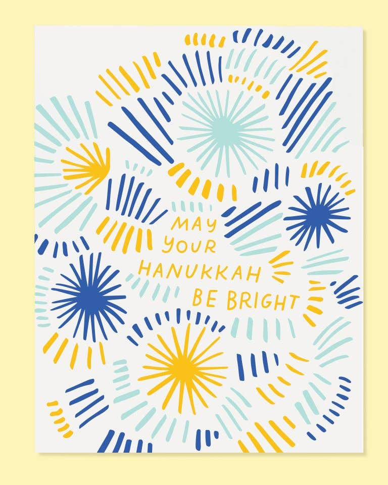 Card with colorful geometric design and 'May your Hanukkah be bright' text on a yellow background