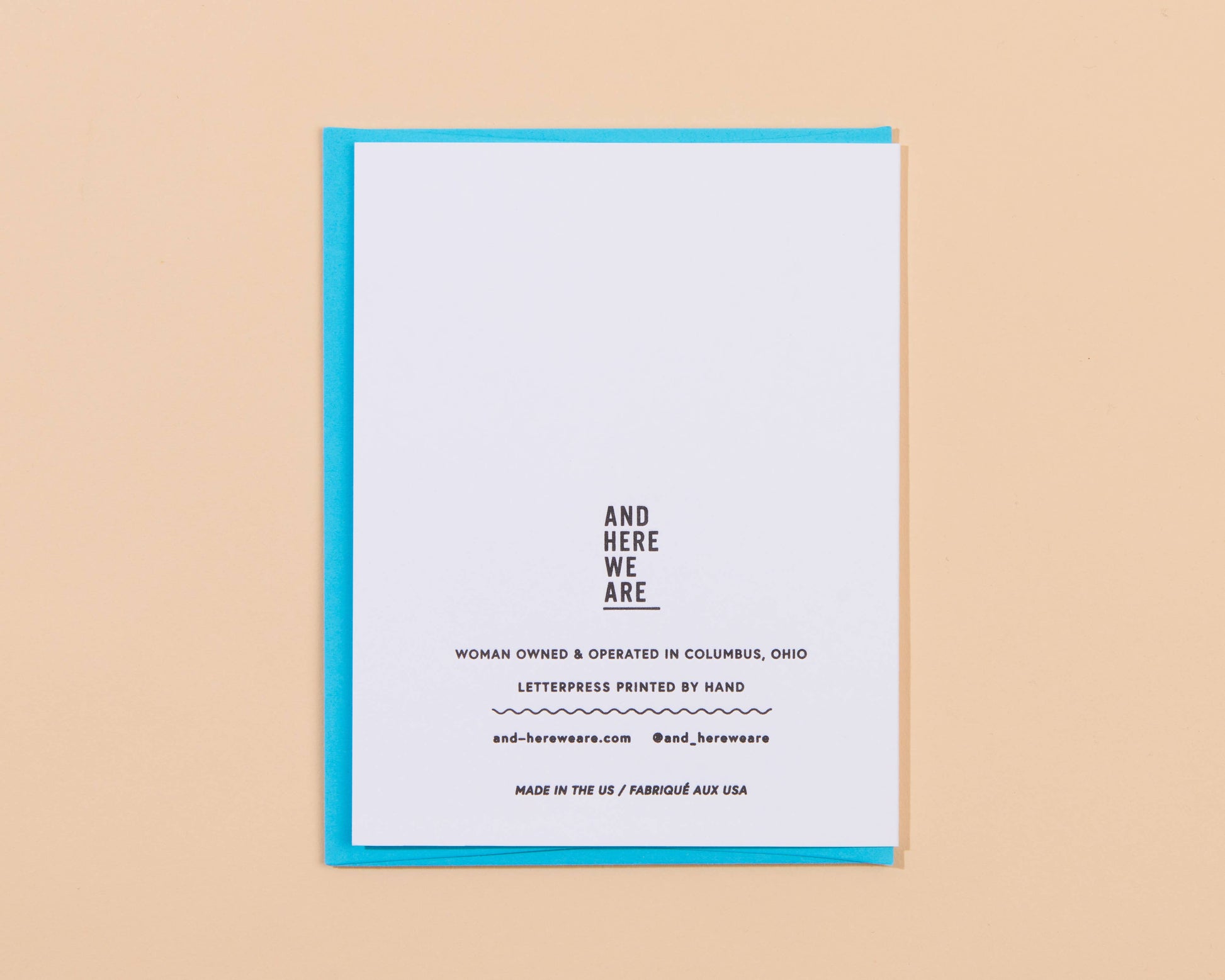 White card with black text on a beige background