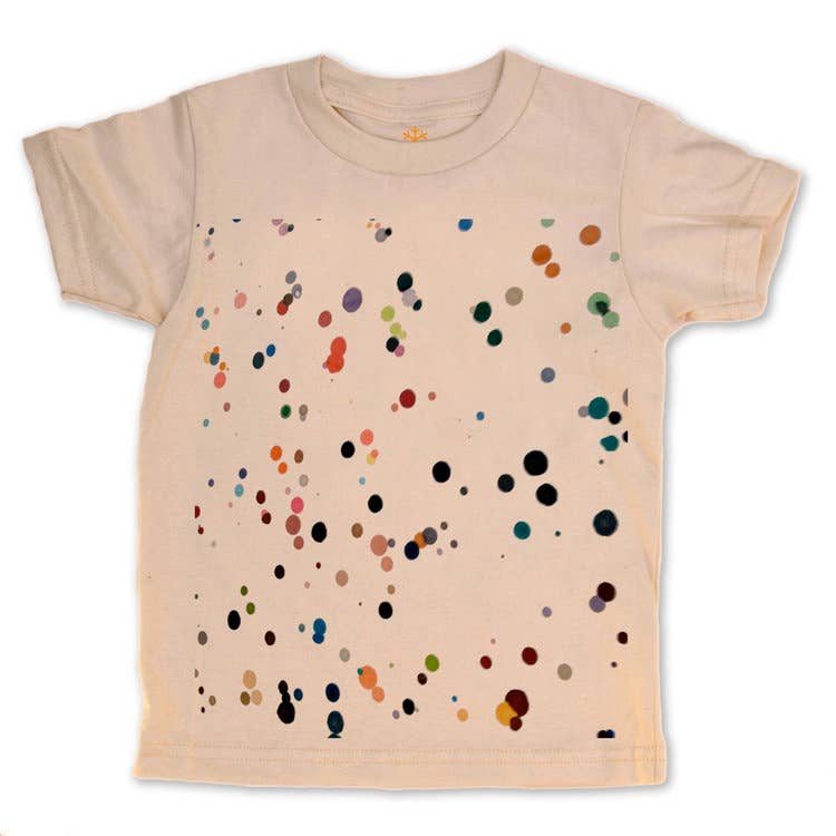 Beige t-shirt with colorful dot pattern on a white background