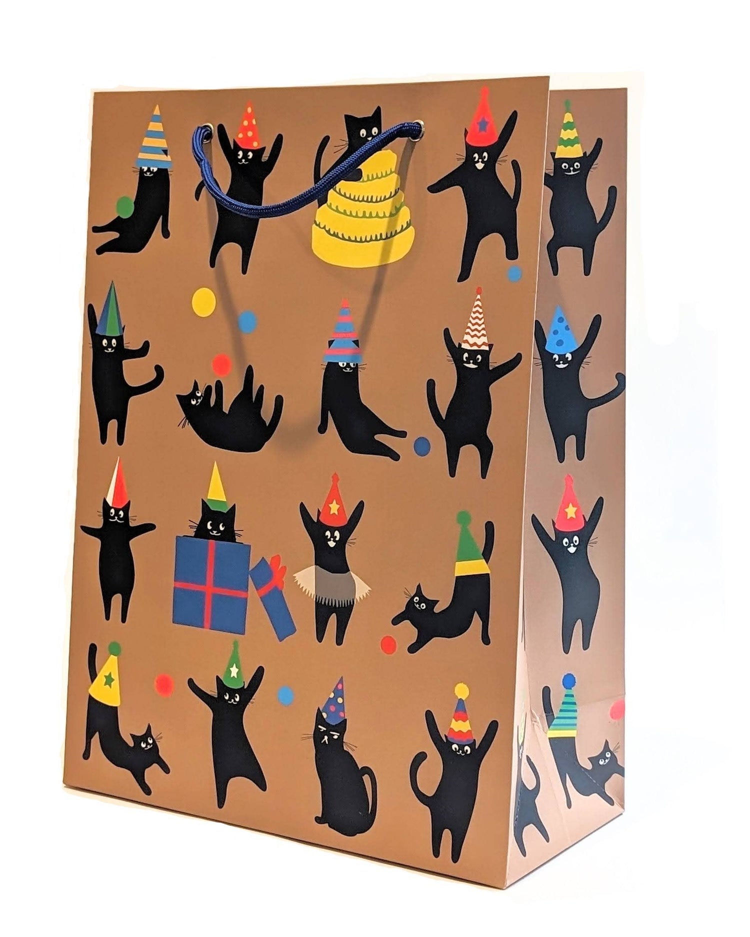 Gift bag with black cats wearing party hats and holding presents on a brown background