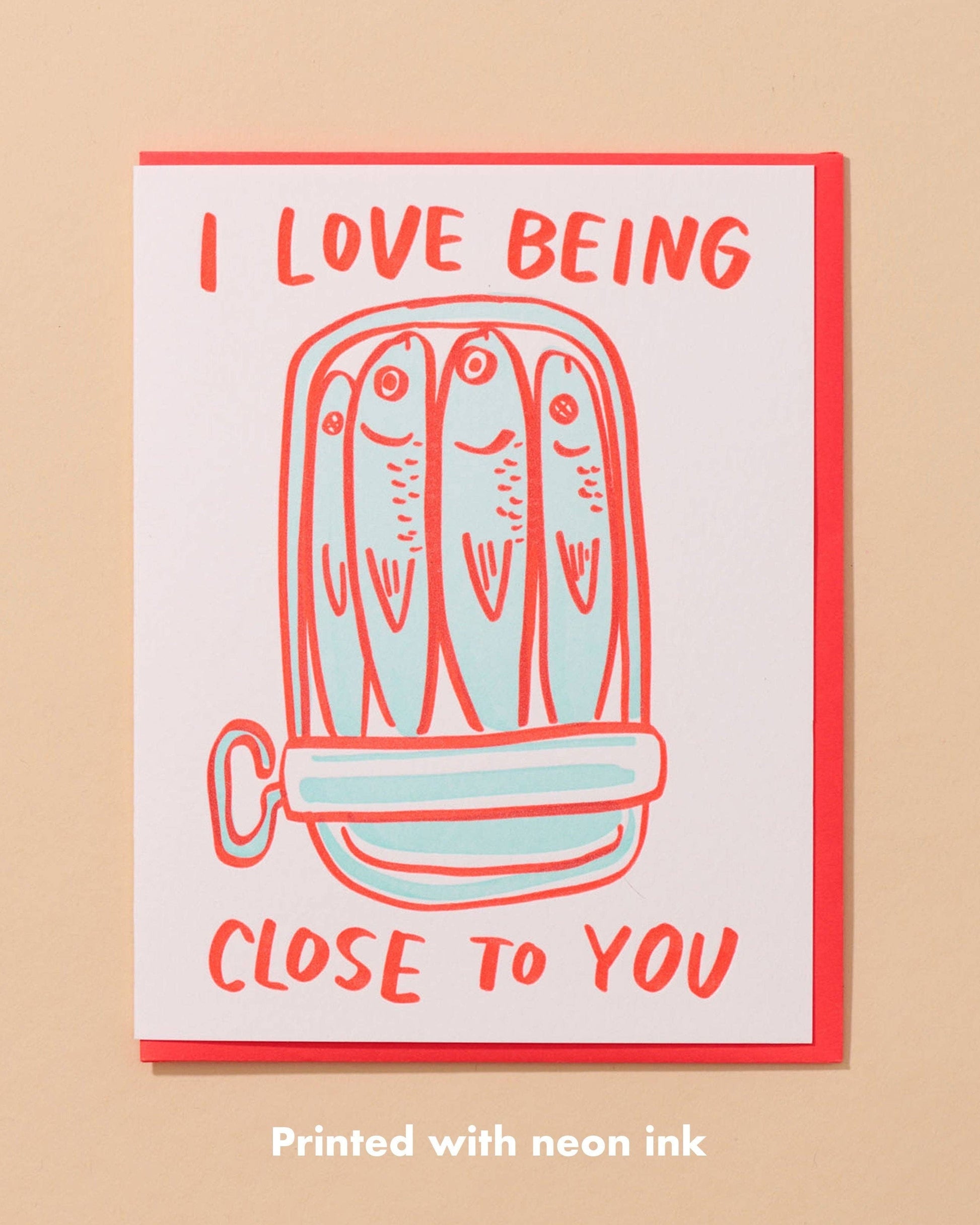 love card with a can of sardines