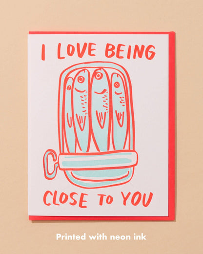love card with a can of sardines