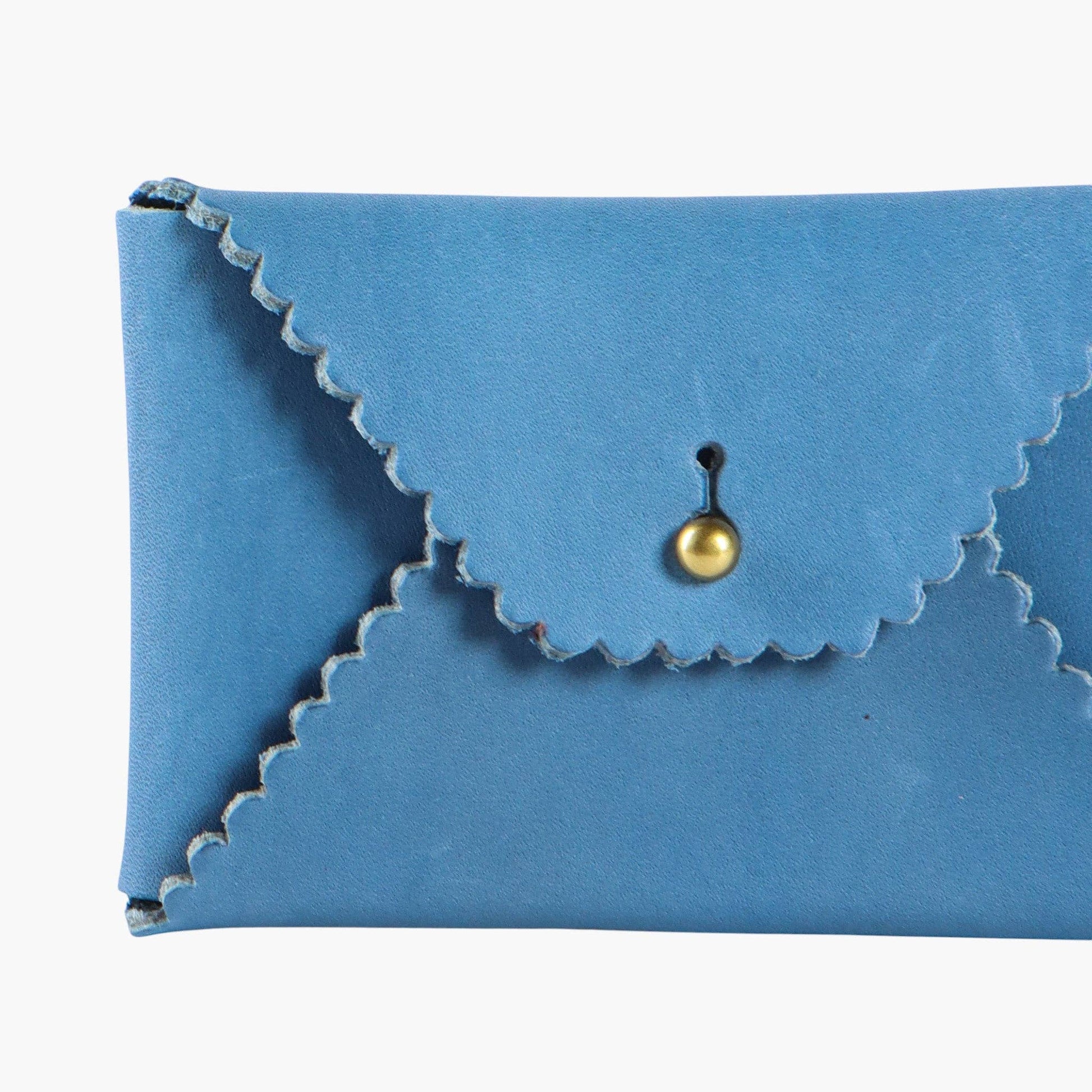Blue envelope leather wallet with a gold clasp on a white background