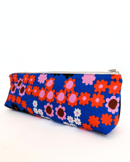 Floral patterned pencil case on a white background