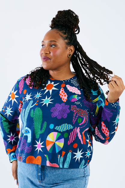 woman wearing a sustainable and soft colorful top