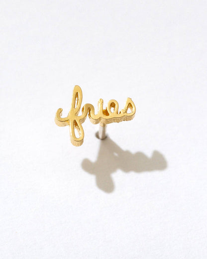 A single gold-plated brass stud earring with the word 'Fries' in cursive script, displayed on a white background.