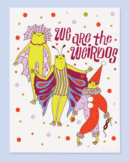 A whimsical greeting card featuring three cartoon frogs in costumes with the text 'we are the weirdos' on a white background, surrounded by colorful polka dots and set against a light blue backdrop.