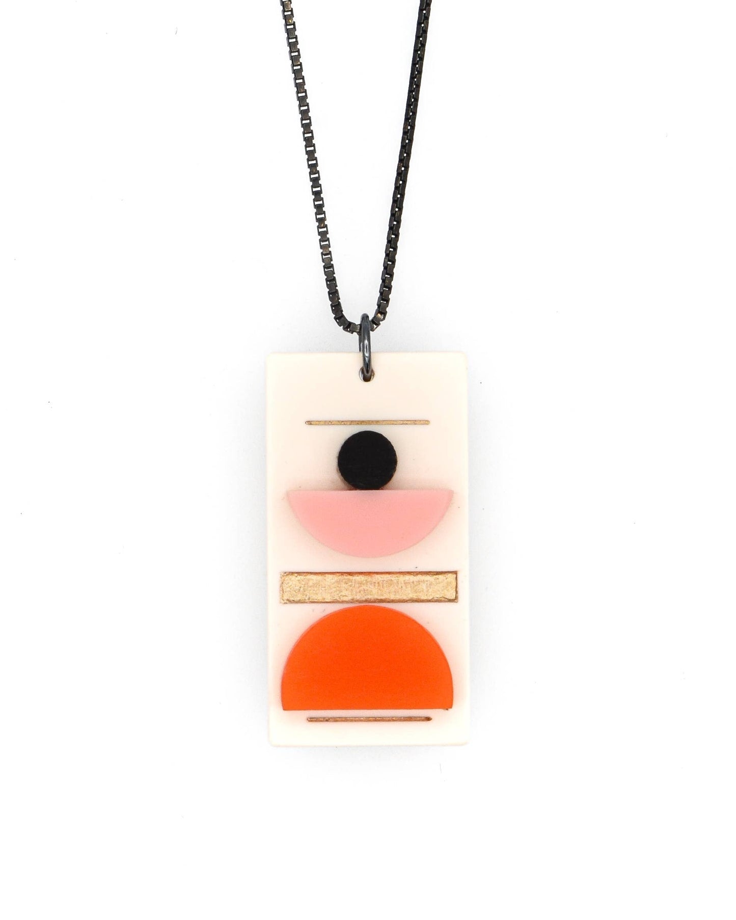 Necklace with a rectangular pendant featuring geometric shapes on a white background