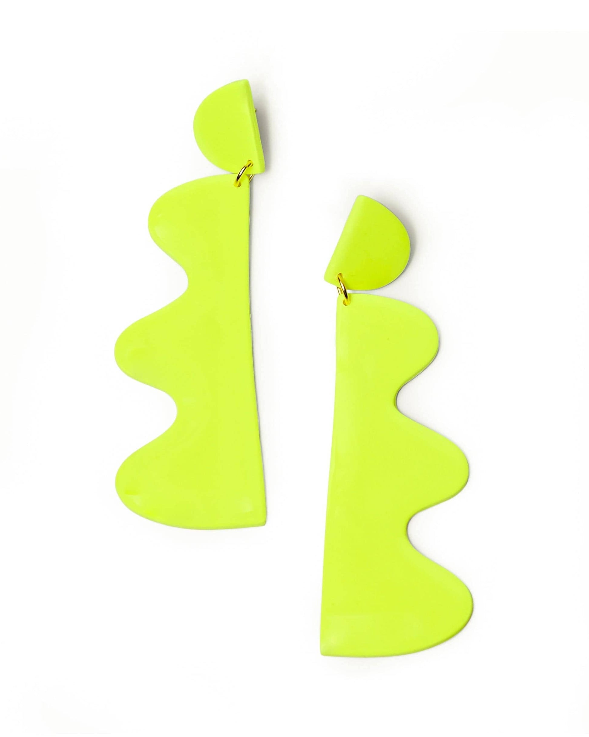 Pair of neon green wavy earrings on a white background