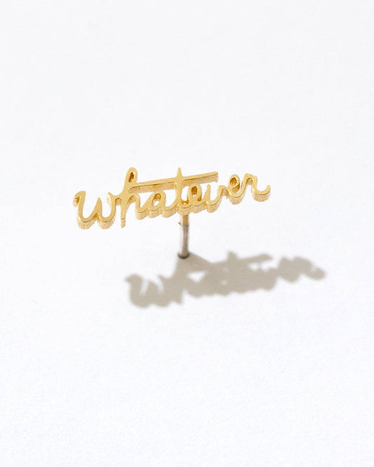 Gold 'Whatever' stud earring on a white background