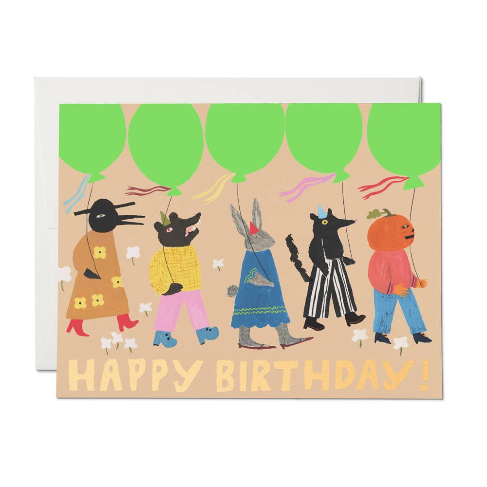 Birthday card with cartoon animals holding balloons and 'Happy Birthday!' text on a beige background.