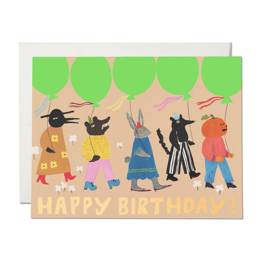 Birthday card with cartoon animals holding balloons and 'Happy Birthday!' text on a beige background.