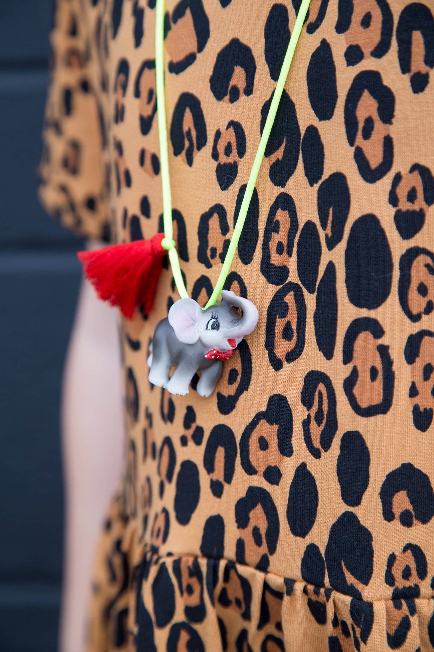 small elephant necklace with red tassel 