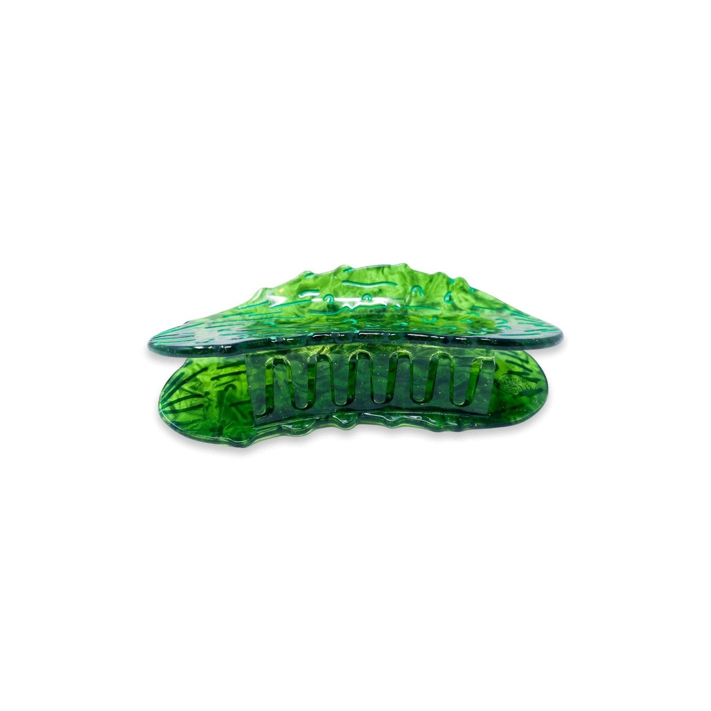 Green pickle hair clip on a white background