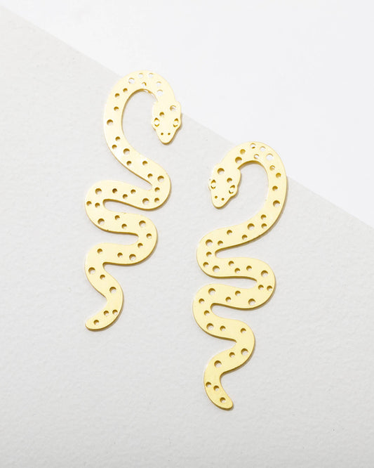 Gold plated brass snake-shaped earrings on a white background.