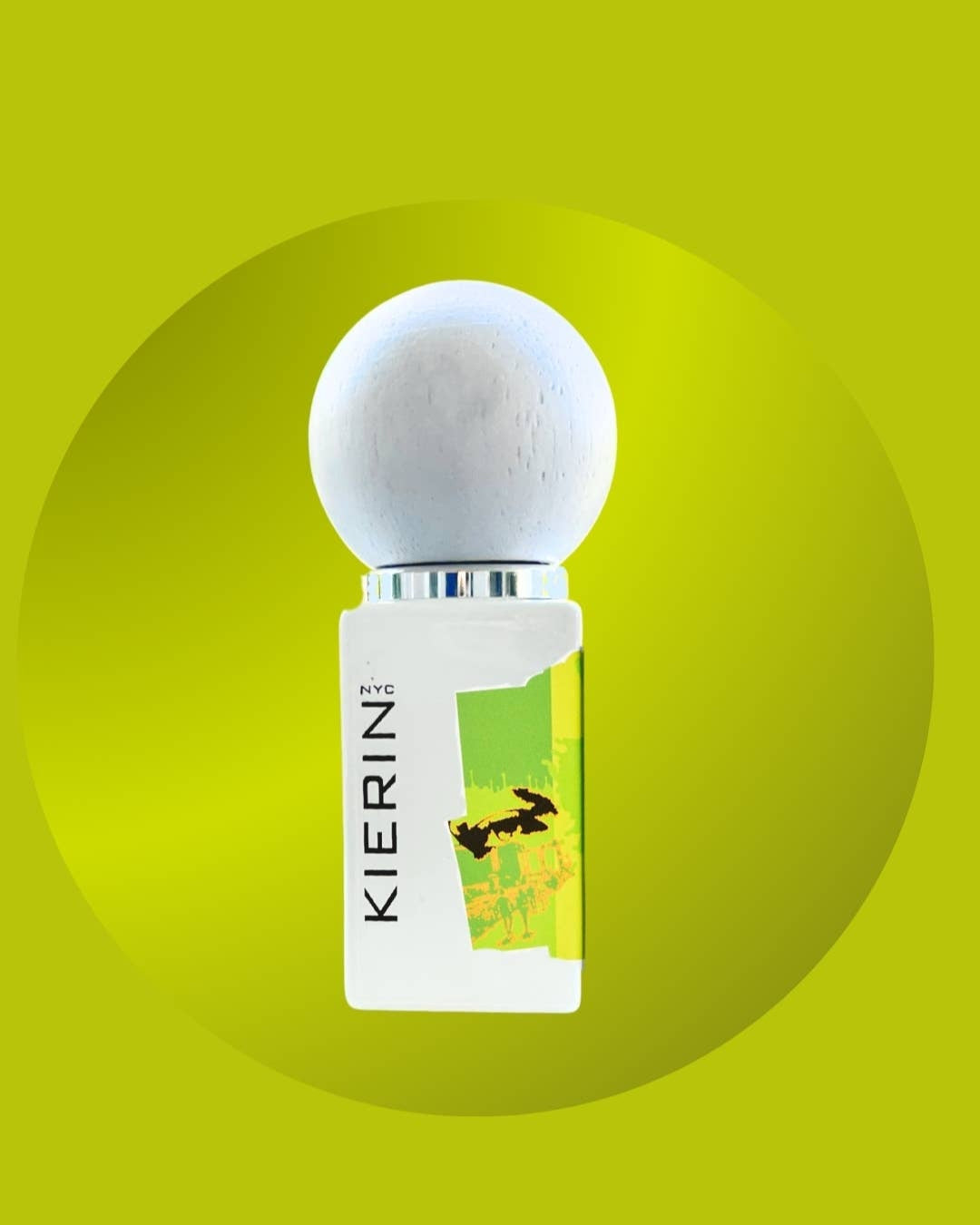 Kierin perfume with a white cap on a green background