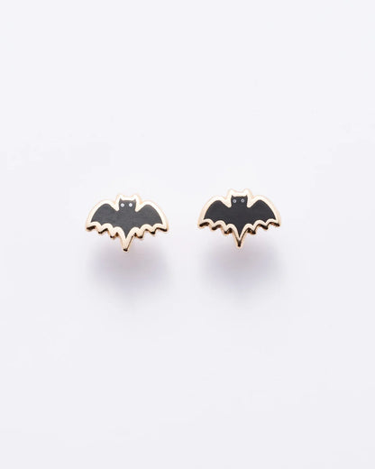 Bat-shaped earrings on a white background