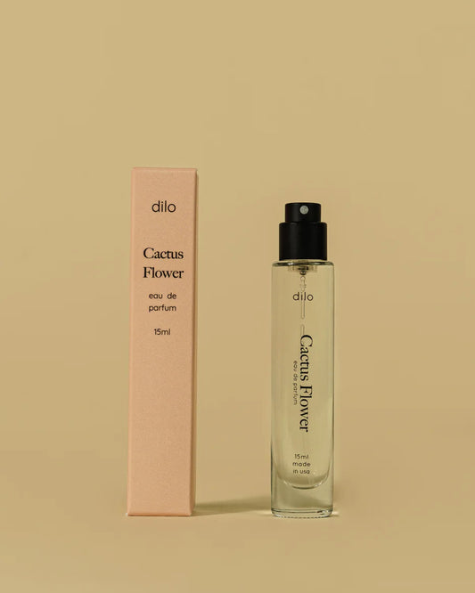 Cactus Flower eau de parfum bottle and packaging on a beige background