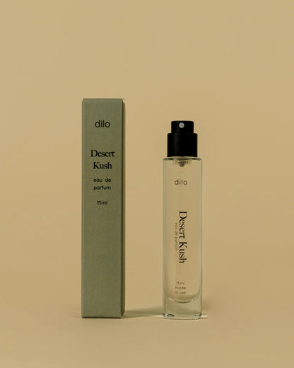 Dilo Desert Kush perfume bottle and packaging on a beige background