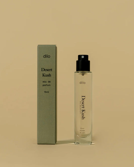 Dilo Desert Kush perfume bottle and packaging on a beige background