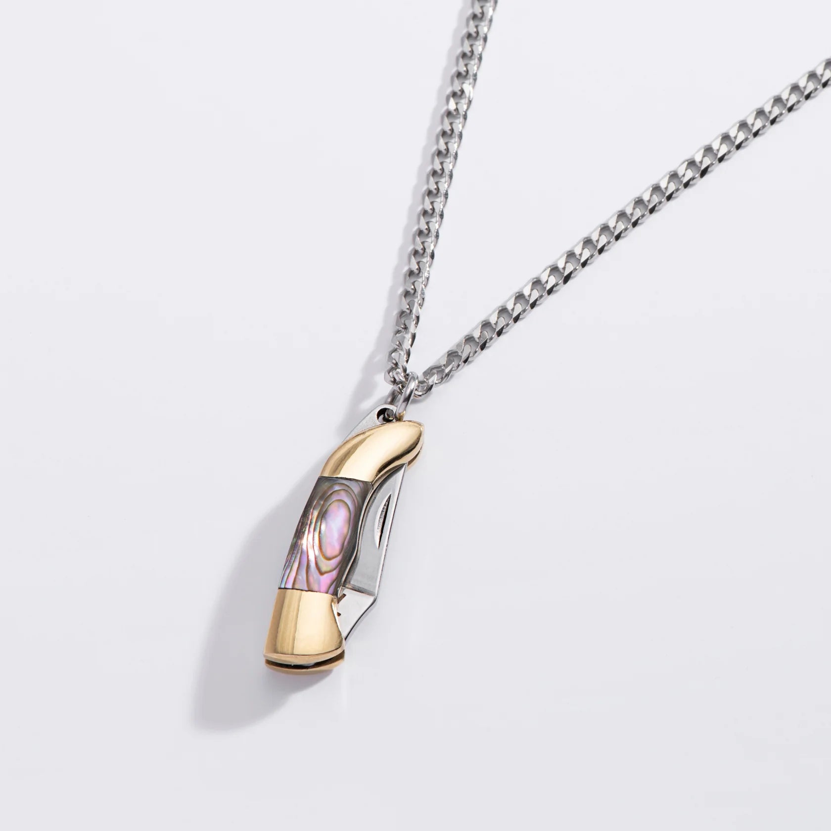 Necklace with a unique pendant on a light gray background