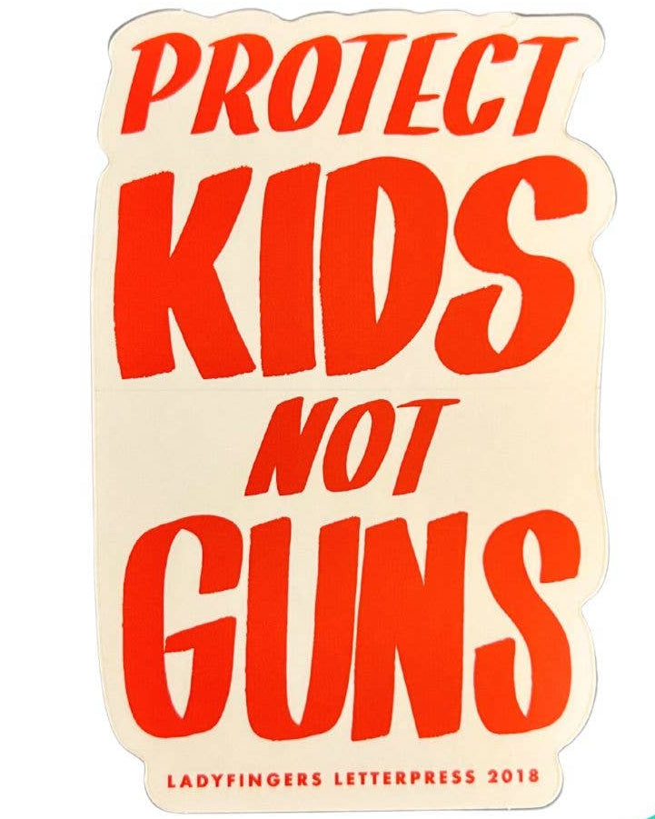 Sticker with 'Protect Kids Not Guns' text on a beige background