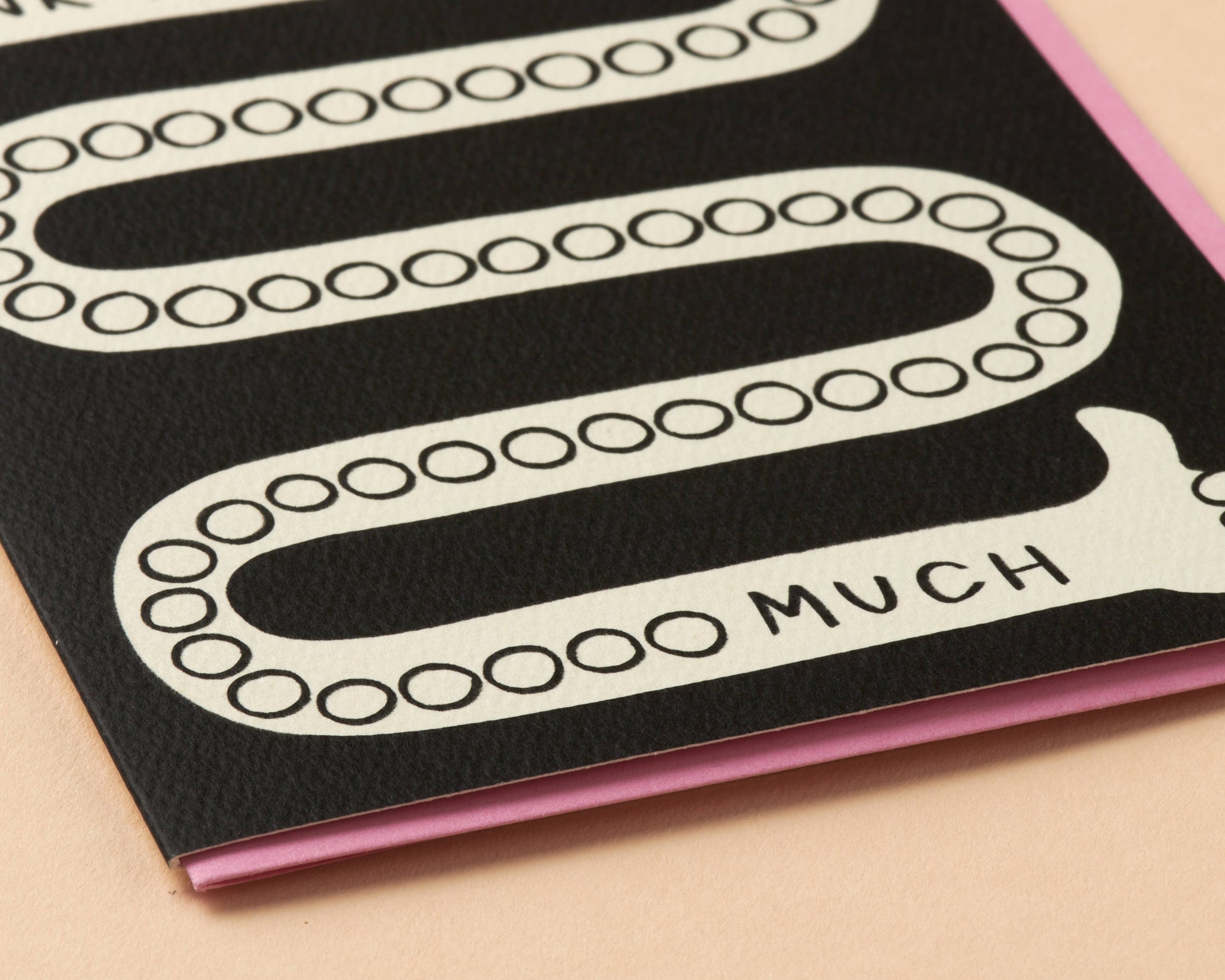 Thank You Card with decorative text and pink border on a beige background