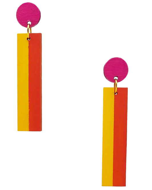 A pair of drop earrings featuring a bright pink circular stud with a small gold ring, connected to a vertical rectangular bar split into two colors: yellow on the left and red-orange on the right, shown against a plain white background.