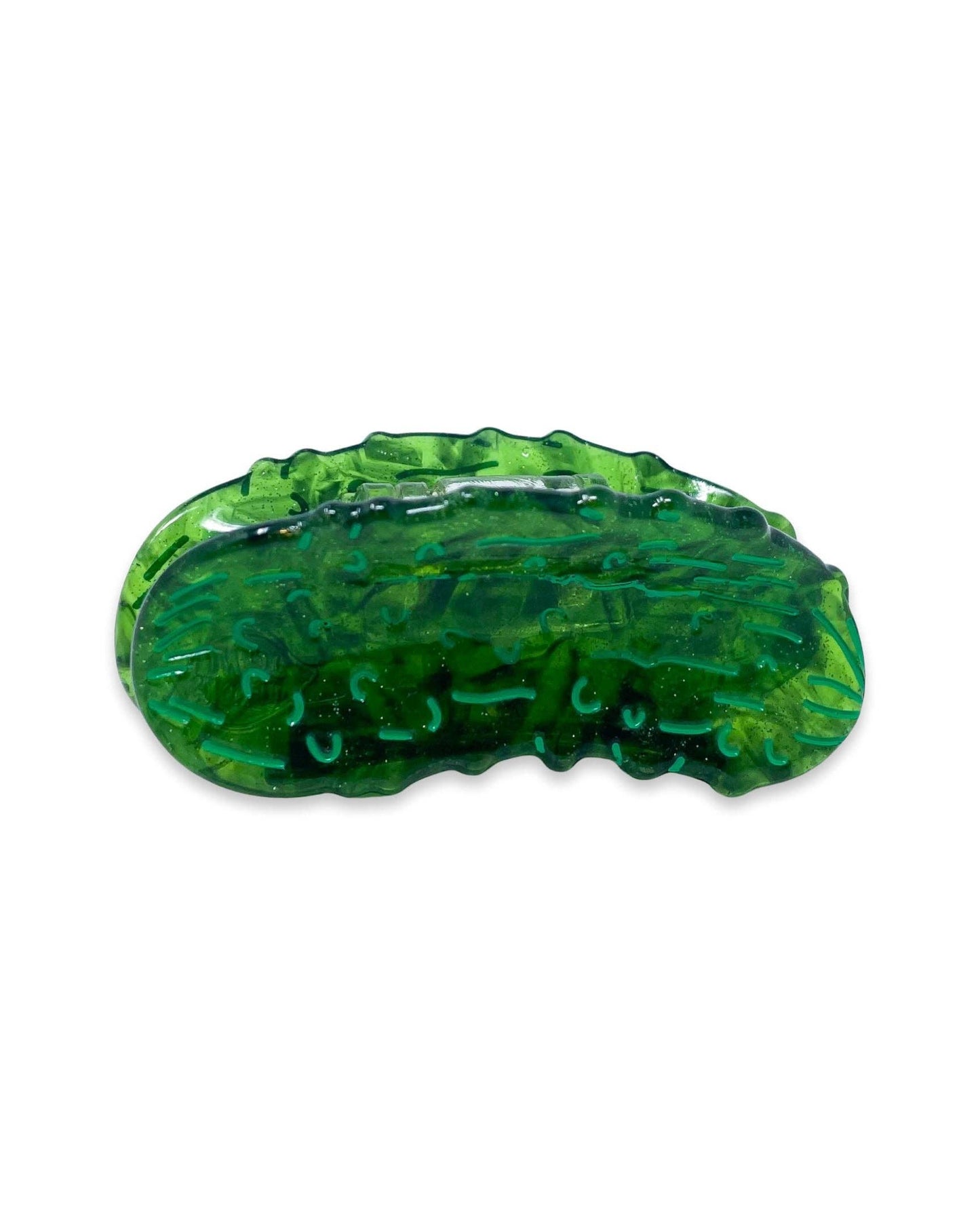 Green plant-based mini hair clip shaped like a pickle on a white background