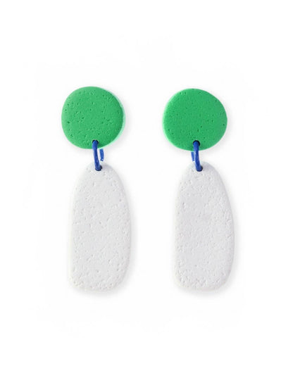 Pair of earrings with green circular tops and white teardrop-shaped bottoms on a white background