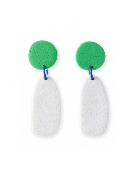 Pair of earrings with green circular tops and white teardrop-shaped bottoms on a white background