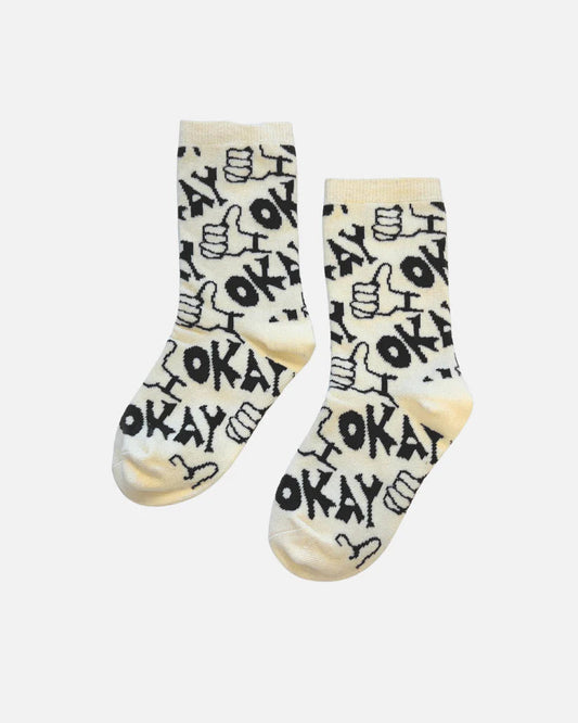 cream kid socks that have a thumbs up and say okay